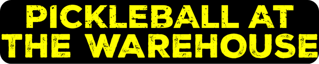 Rounded black badge graphic containing distressed yellow text reading "PICKLEBALL AT THE WAREHOUSE" across two lines on a transparent background.